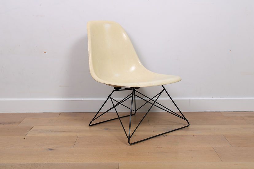 A Vintage Mid Century Eames Fibreglass Lsr Chair By Herman Miller Cats Cradle