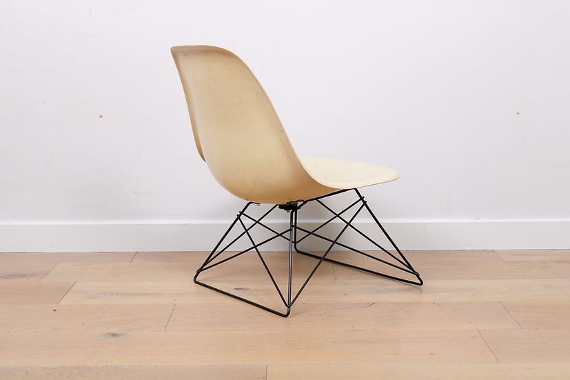 A Vintage Mid Century Eames Fibreglass Lsr Chair By Herman Miller Cats Cradle photo for sale