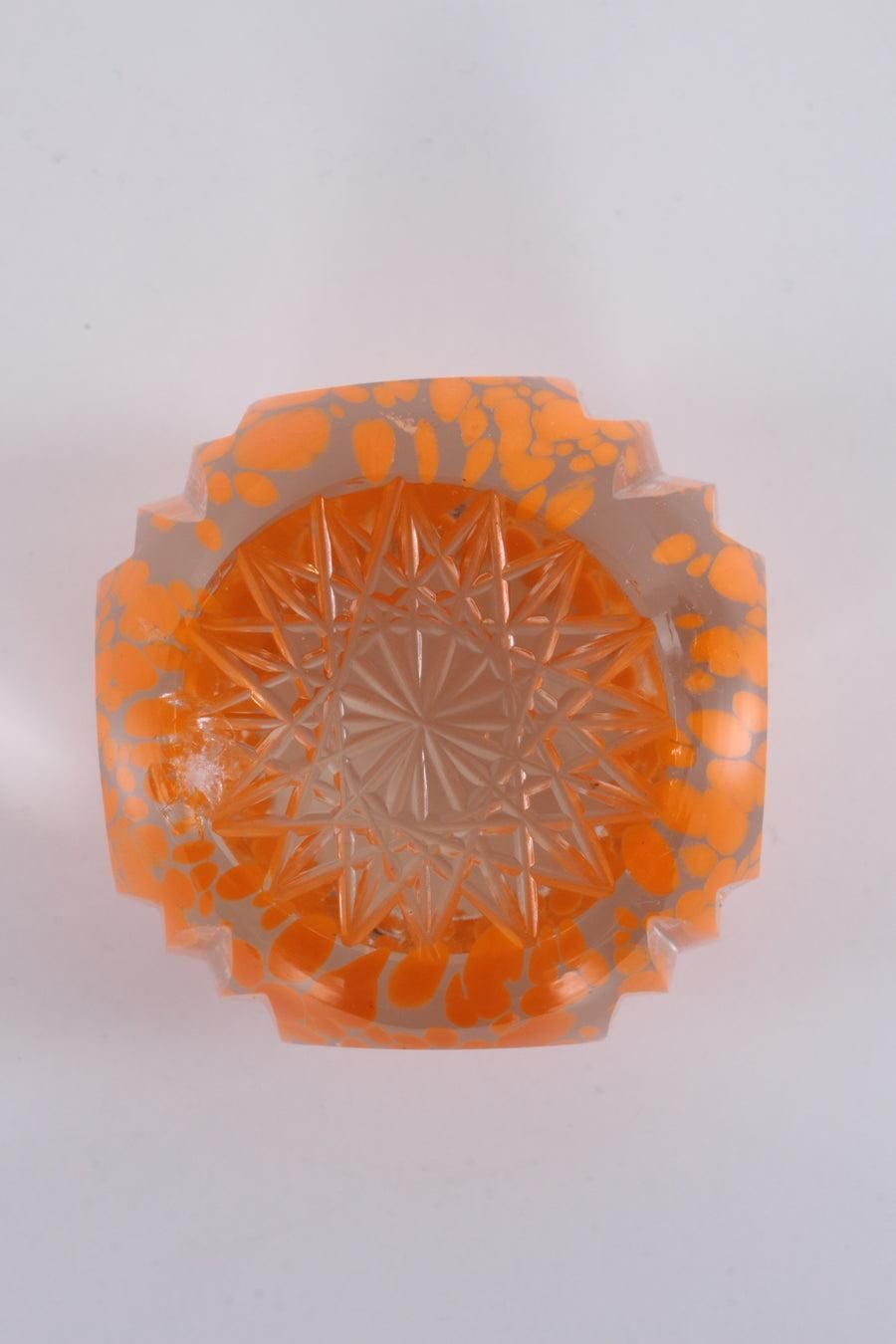 Paperweight With A Nice Sleek Finish And A Beautiful Orange Colour photo furniture