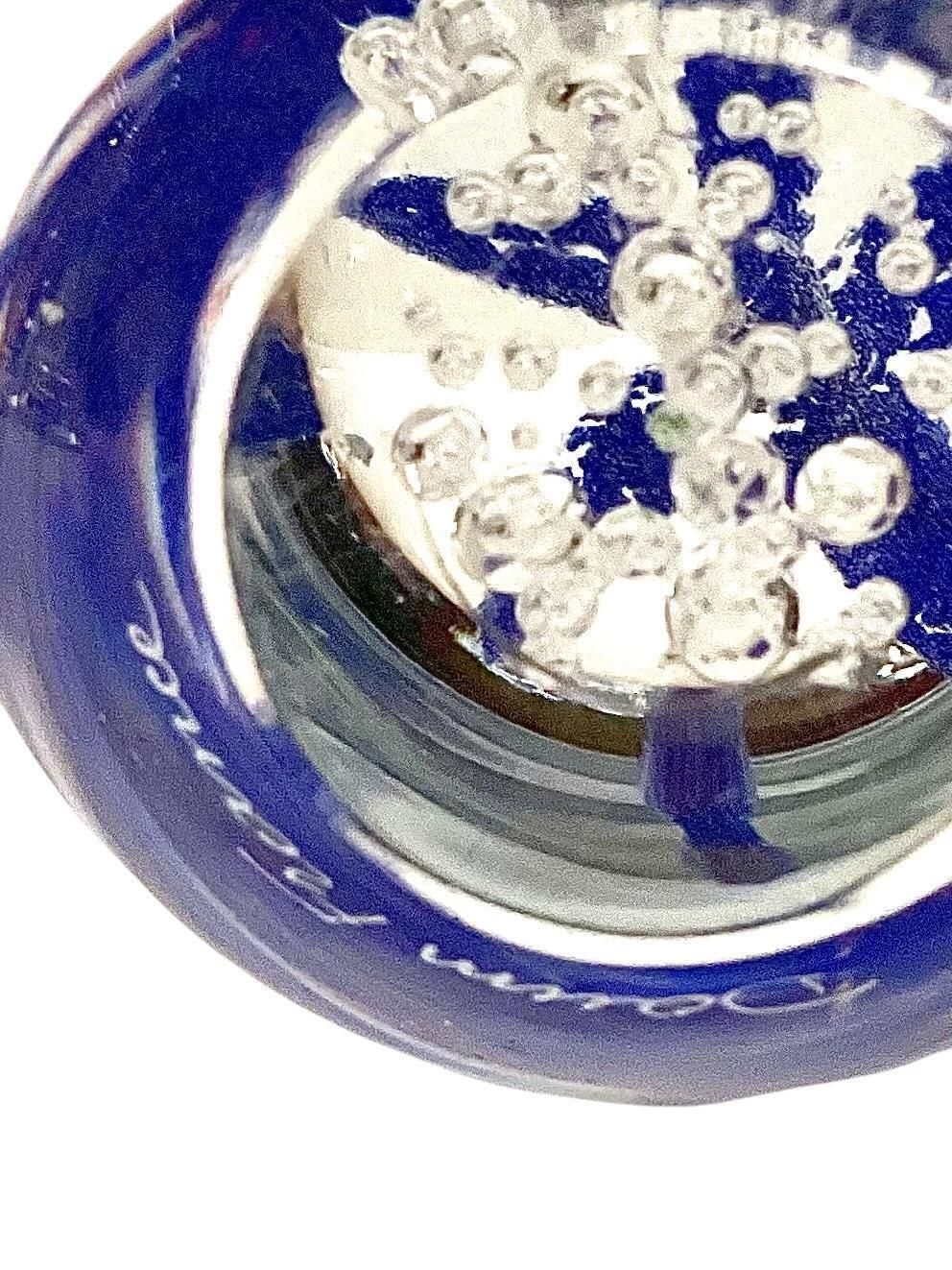 557.0 By Daum Sulphide Paperweight With Blue Flower photo