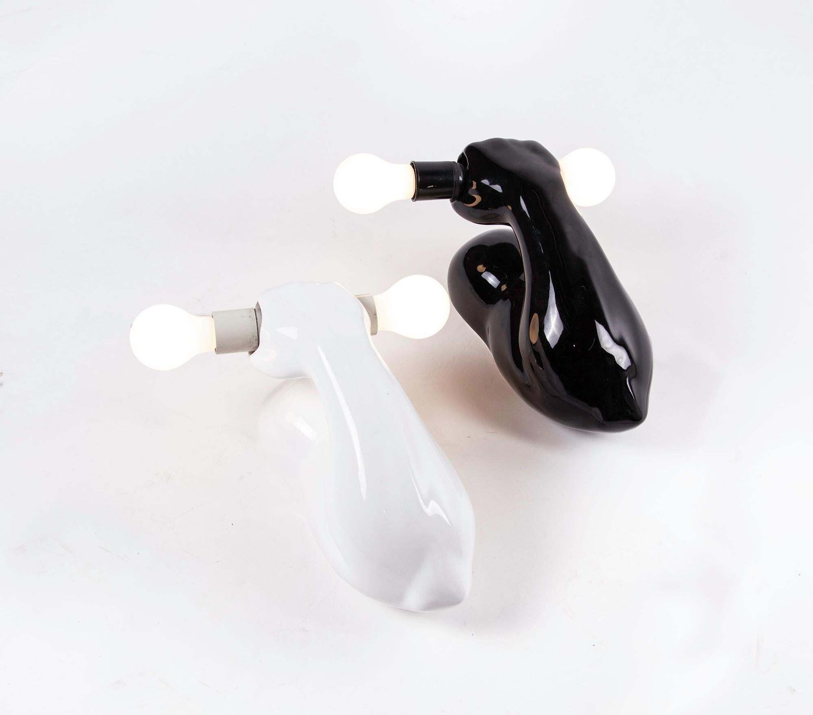 1980 French J.C. Peiré Pair Of Black & White Ceramic Biceps Wall Lights photo for sale