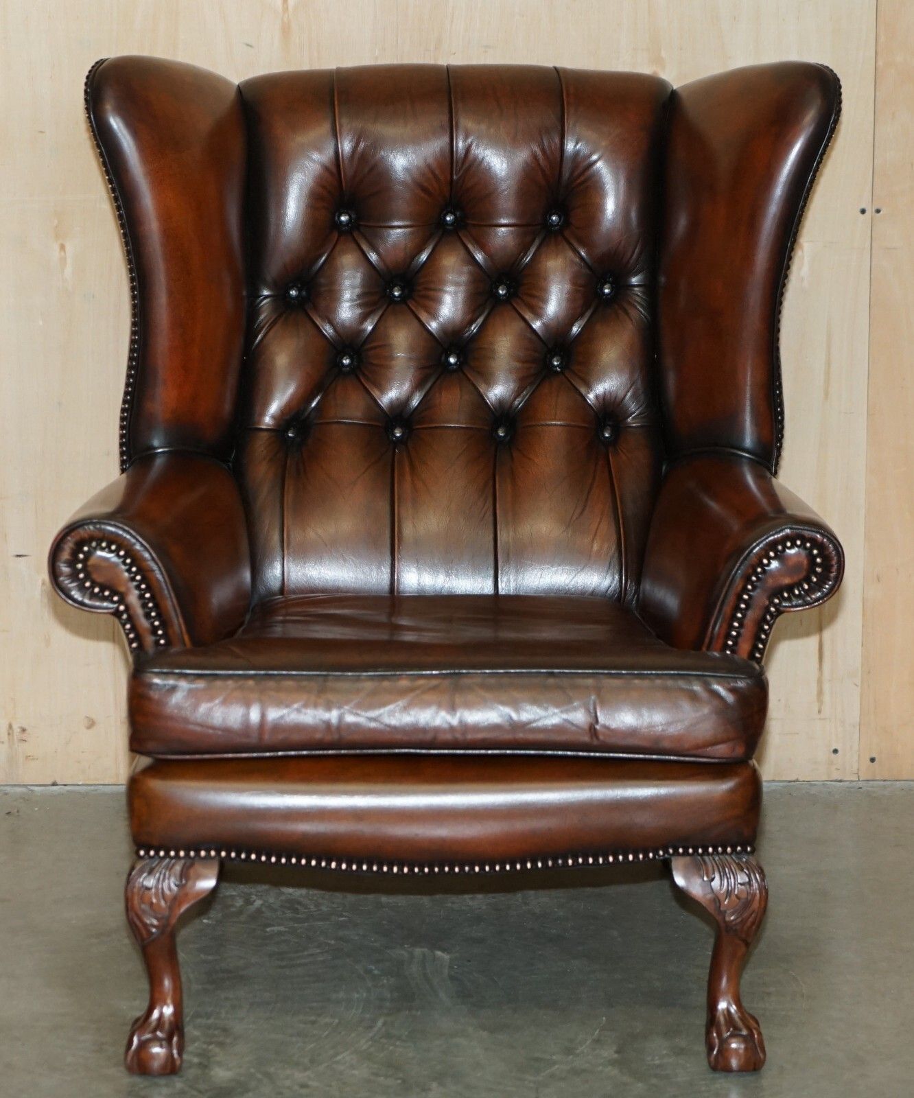Pair Of Claw & Ball Feet Chesterfield Tufted Brown Leather Wingback Armchairs photo for sale