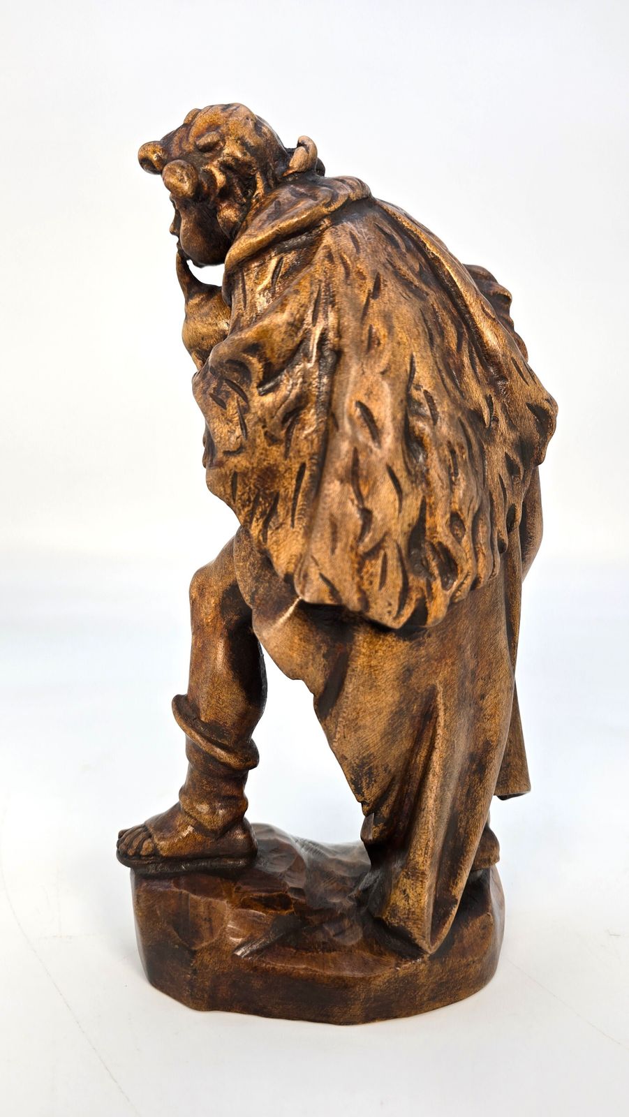 A Swiss Vintage Wooden Limewood Carving A Man Playing The Bagpipes, Circa 1880 photo for sale