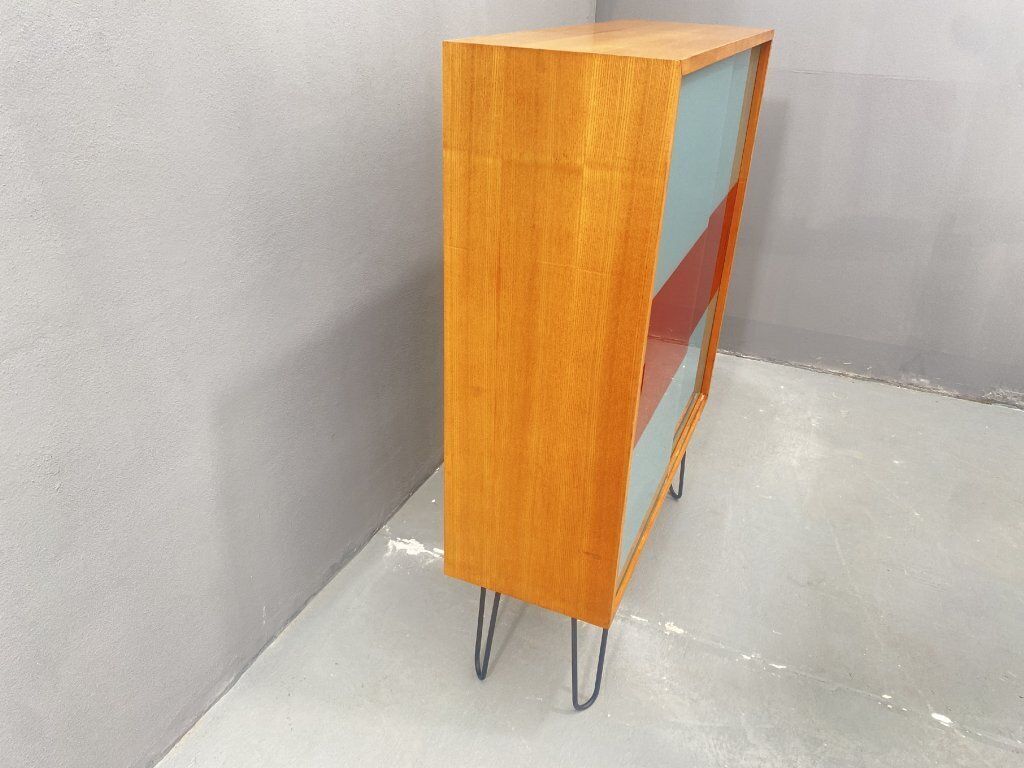Dřevotvar Hradec Králové Cabinet With Metal Legs And Colored Glass photo buy