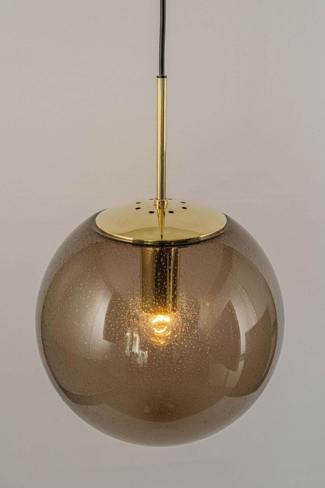 photo furniture Large Limburg Brass With Smoked Glass Ball Pendant, Germany, 1970s
