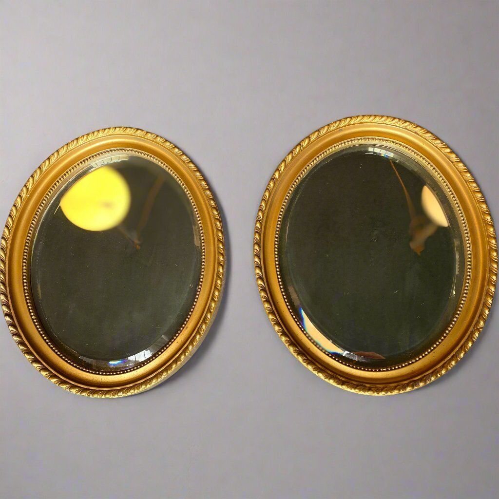Pair Of Antique Carved Gilt Oval Mirrors Circa 1910