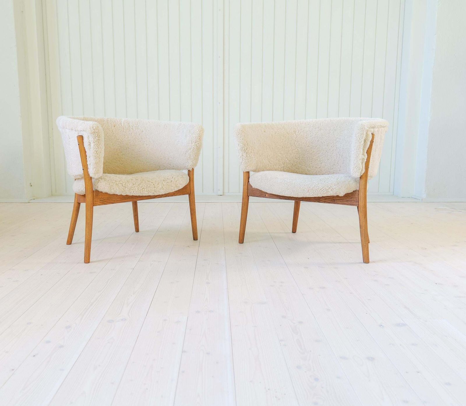 photo furniture Mid Century Lounge Chairs In Sheepskin/Shearling And Stained Wood, Sweden, 1962
