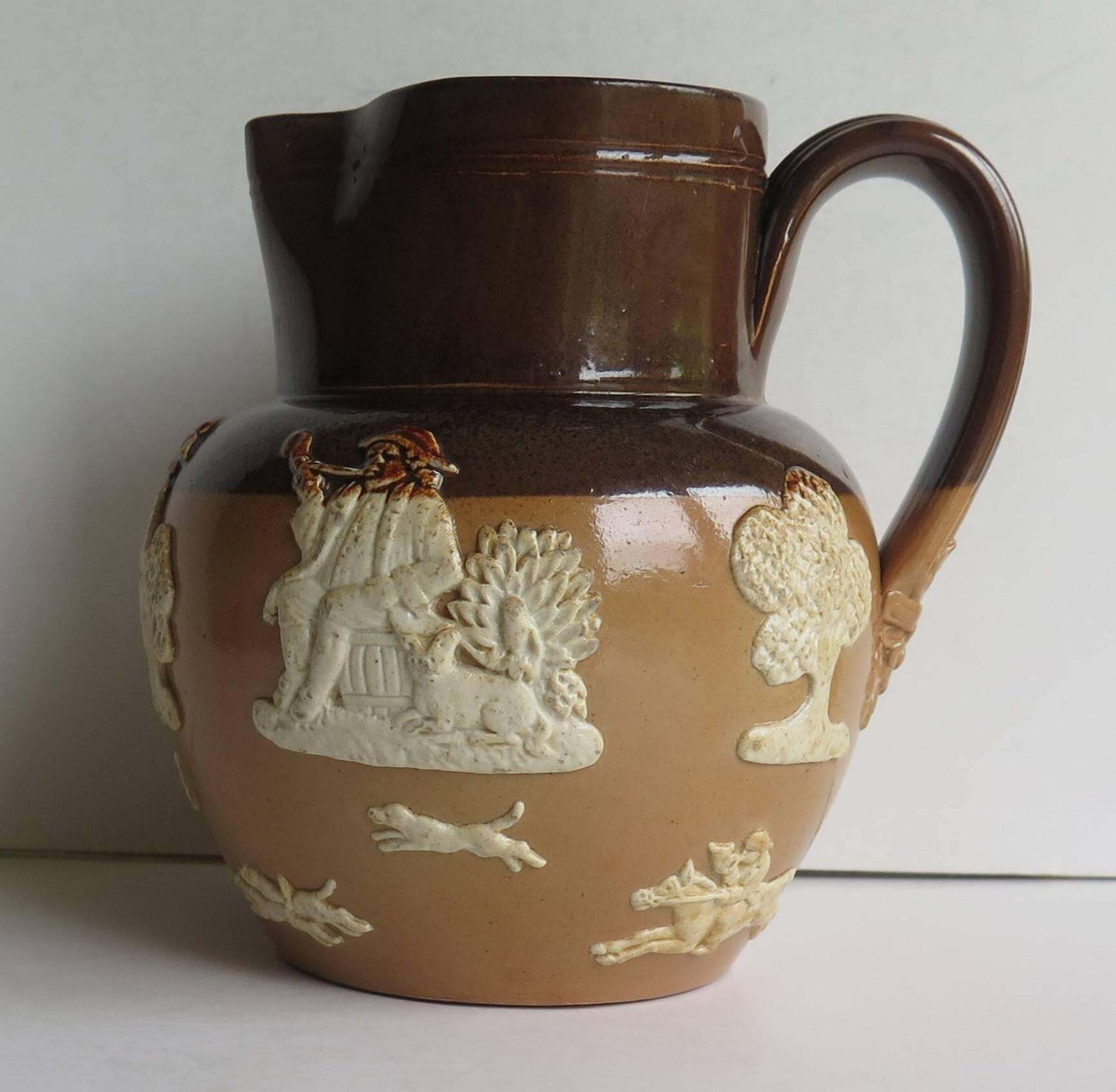 Royal Doulton Stoneware Jug Or Pitcher Moulded Farming Scene, Edwardian Ca 1905 photo for sale