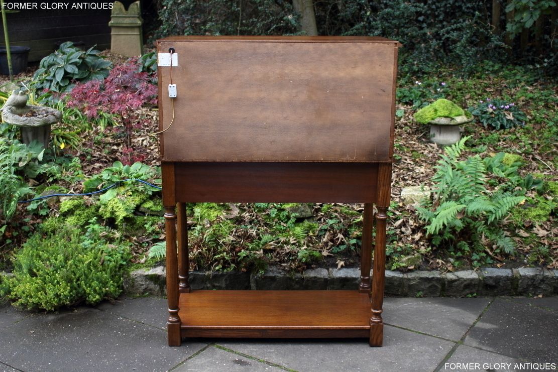 A Jaycee Autumn Gold Carved Oak Drinks / Cocktail / Wine Cabinet photo buy