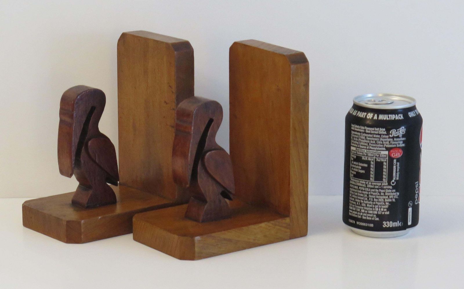 photo buy Art Deco Pair Of Pelican Figure Bookends In Hand Carved Woods, Circa 1930