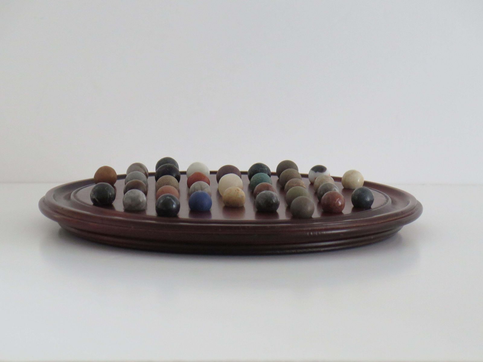 Marble Solitaire Game 10 Inch Hardwood Board 35 Mixed Stone Marbles, Circa 1945 photo buy