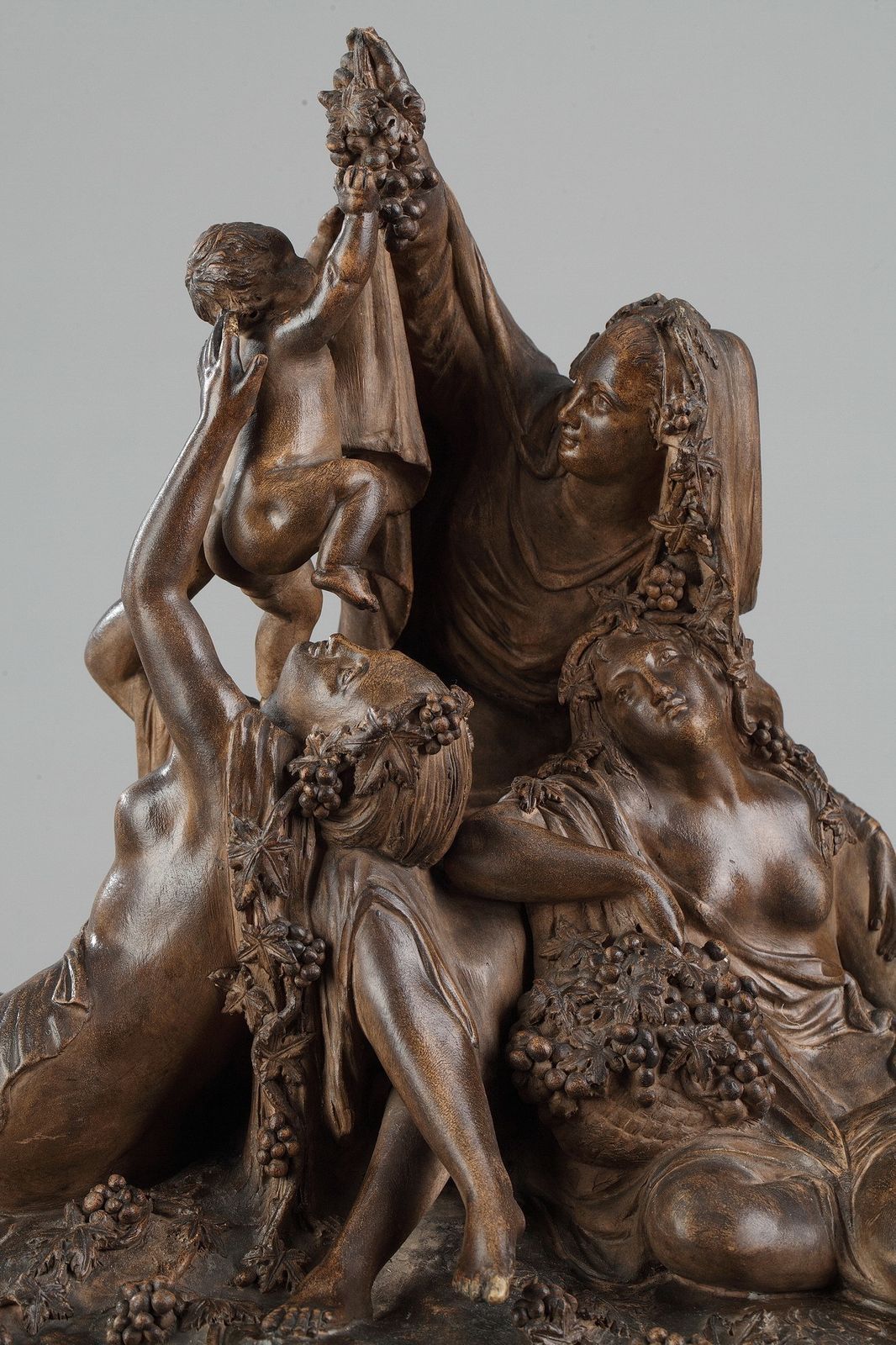Groupe en terre cuite du XIXe siècle « Bacchus et les Bacchantes célébrant la vendange » photo for sale