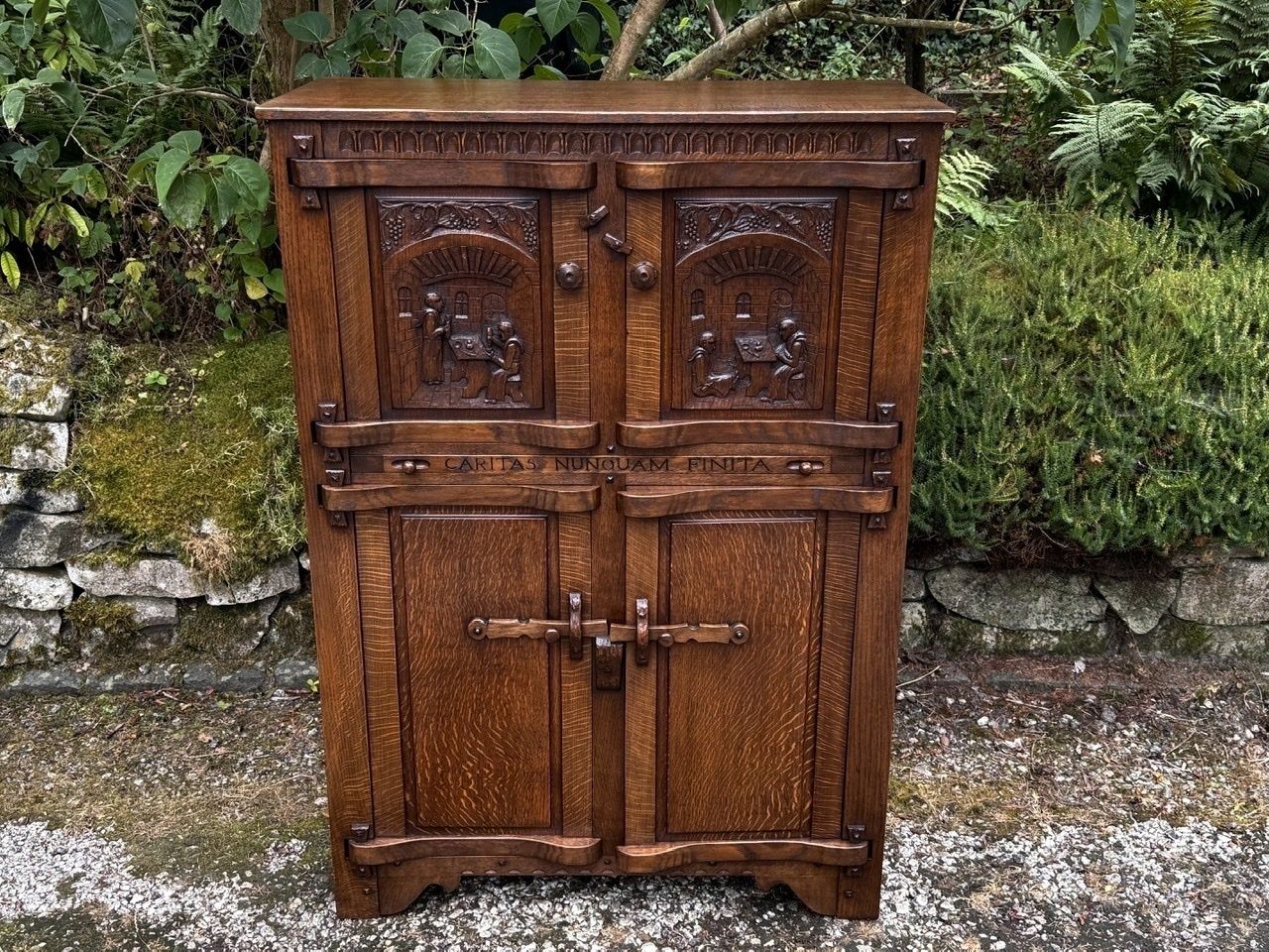 A Nigel Griffiths Monastic Carved Oak Flemish Drinks Cabinet / Wine Cupboard