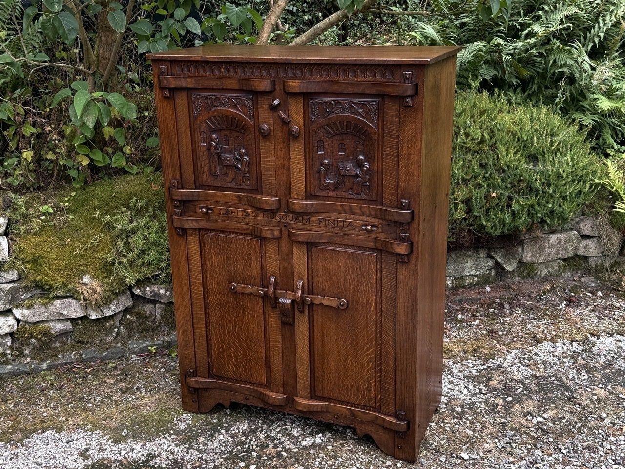 A Nigel Griffiths Monastic Carved Oak Flemish Drinks Cabinet / Wine Cupboard photo for sale