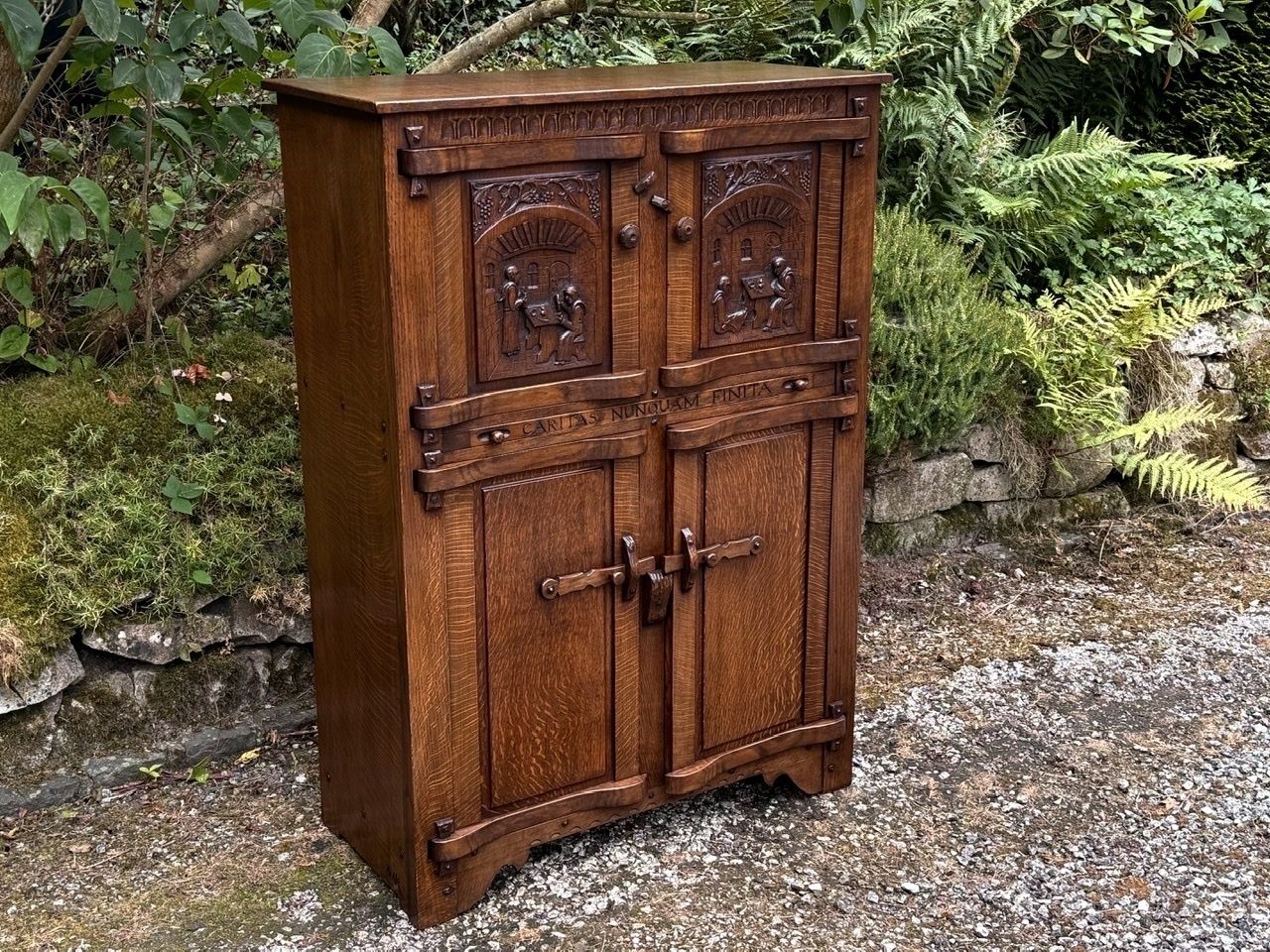 photo buy A Nigel Griffiths Monastic Carved Oak Flemish Drinks Cabinet / Wine Cupboard