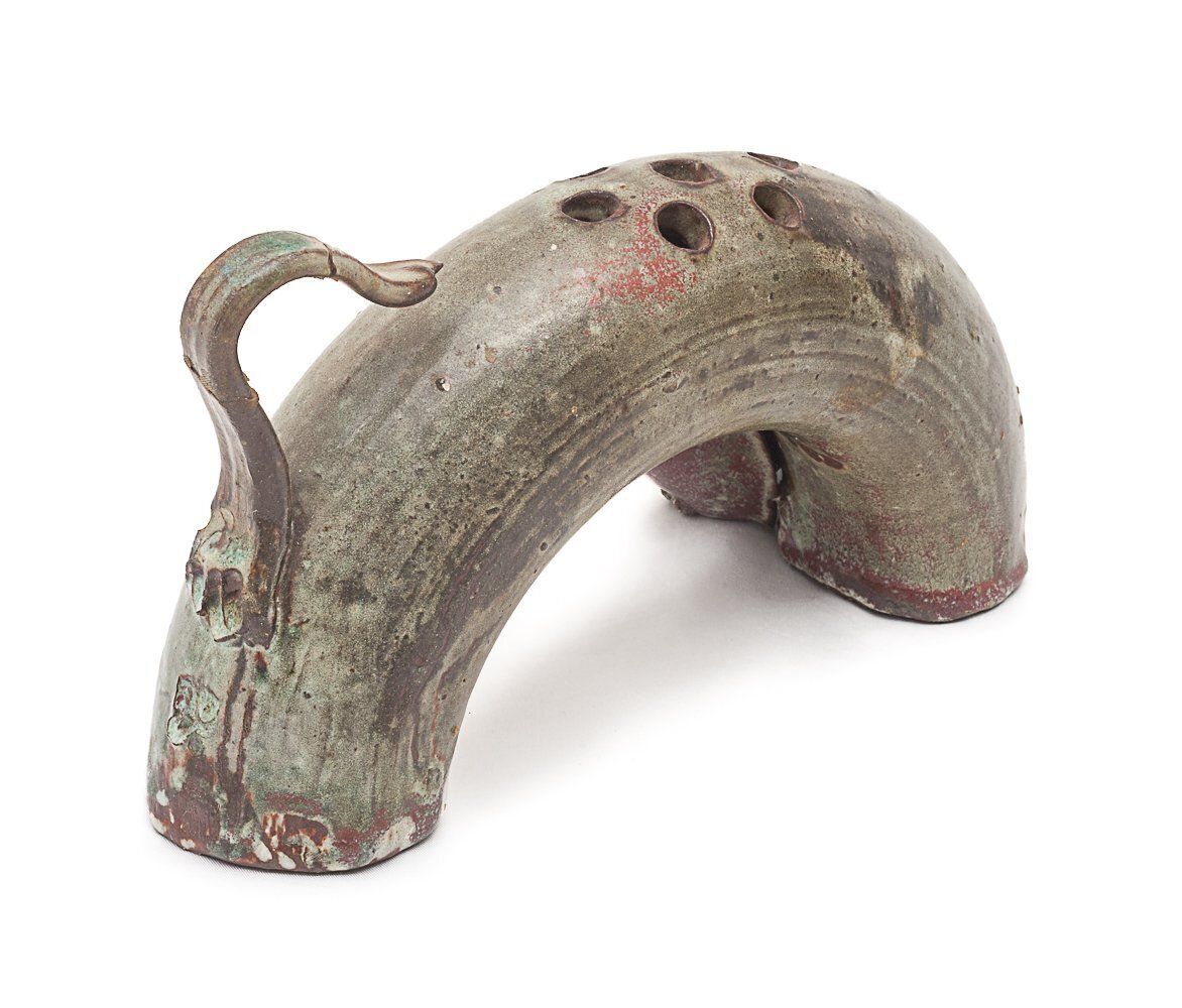 Ceramic Representing A Stylized Cat. photo Home Decor