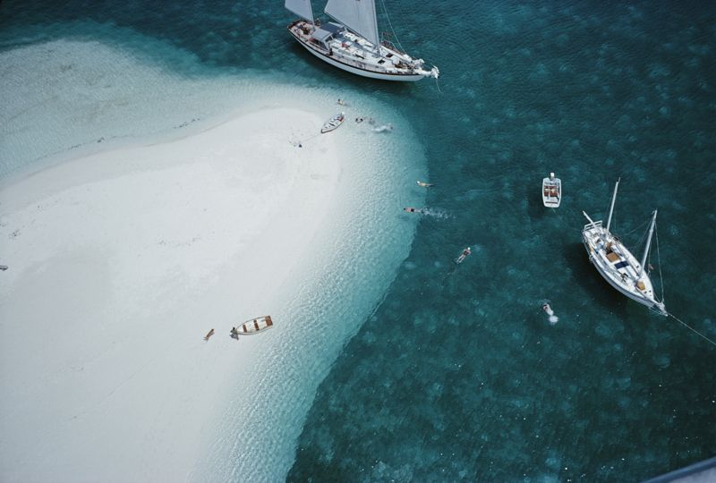 Slim Aarons 'Stocking Island, Bahamas' Framed White