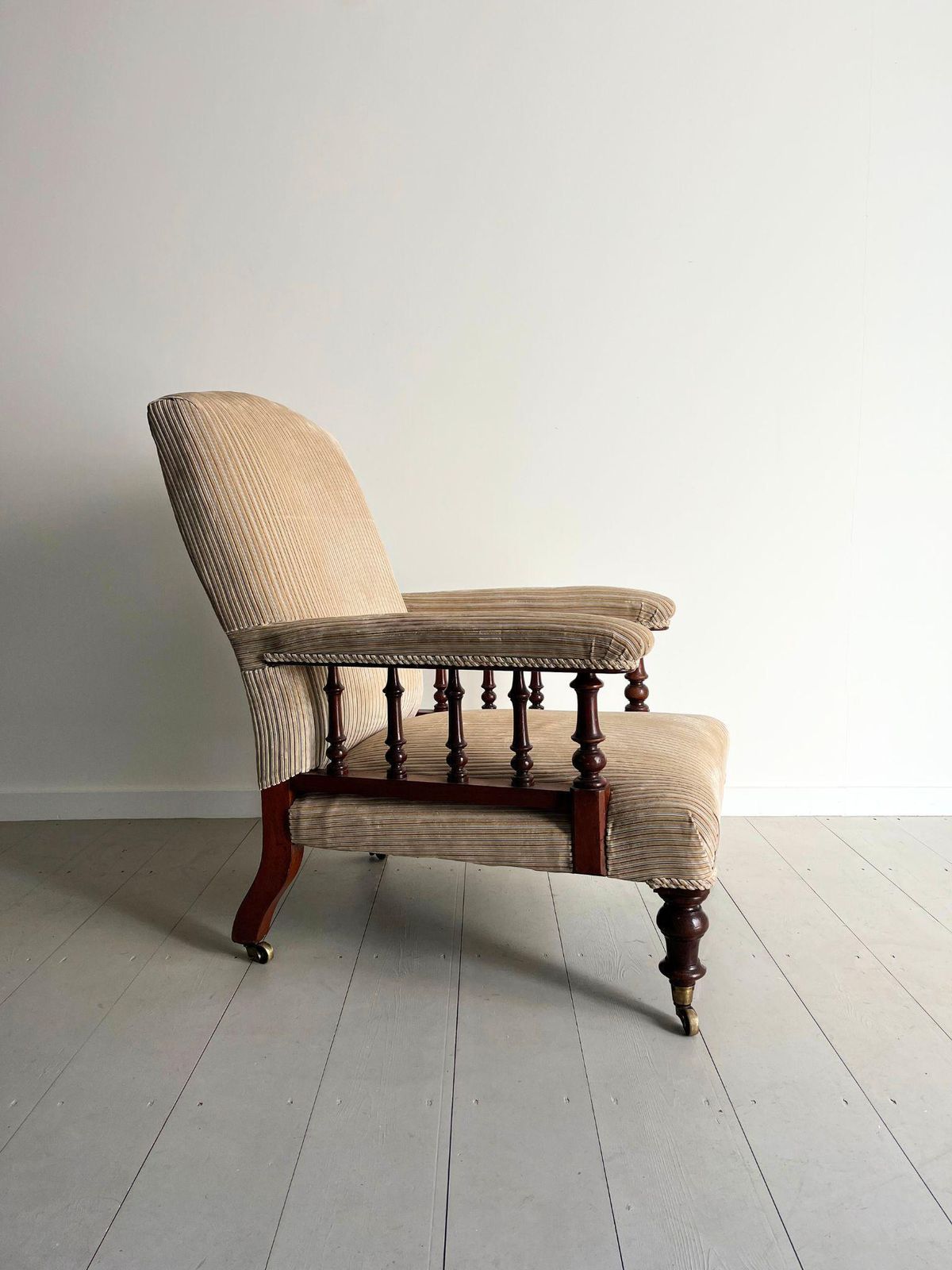 Antique Armchair Howard Style Open Arm Upholstered Gentleman's Chair 19th Century Neutral Beige Cord Fabric And Turned Legs & Brass Castors photo Furniture
