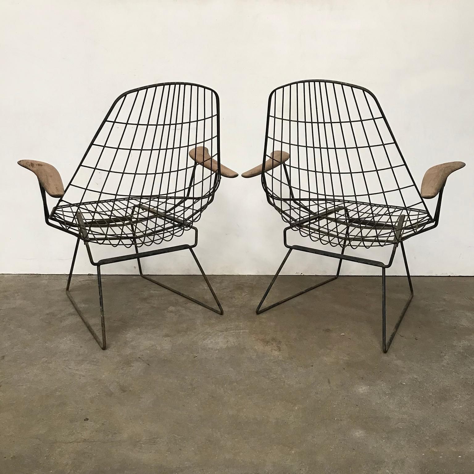 photo furniture Set Of Two Rare Black Wire Easy Chairs With Wooden Armrests, Circa 1960