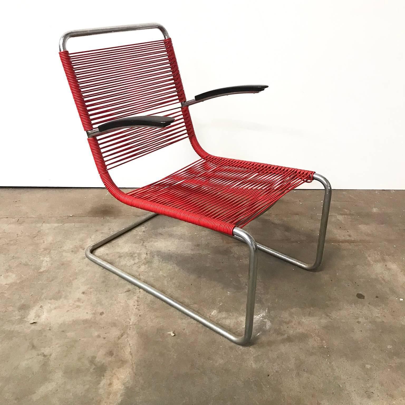 1934, W.H. Gispen For Gispen Culemborg, Rare Gispen 411 In Red Plastic Strings photo furniture