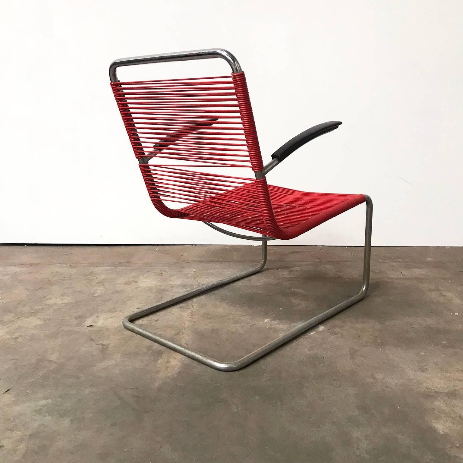 1934, W.H. Gispen For Gispen Culemborg, Rare Gispen 411 In Red Plastic Strings photo Furniture