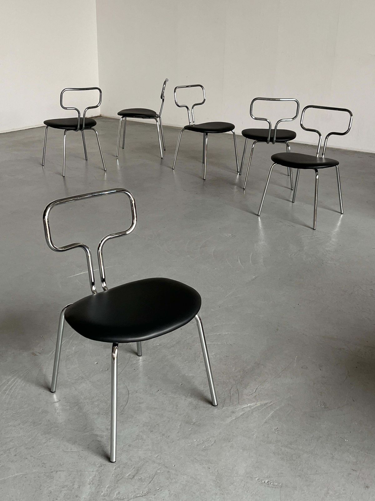 Bauhaus Design Curved Chrome Tubular Steel And Faux Leather Dining Chairs photo 320.0