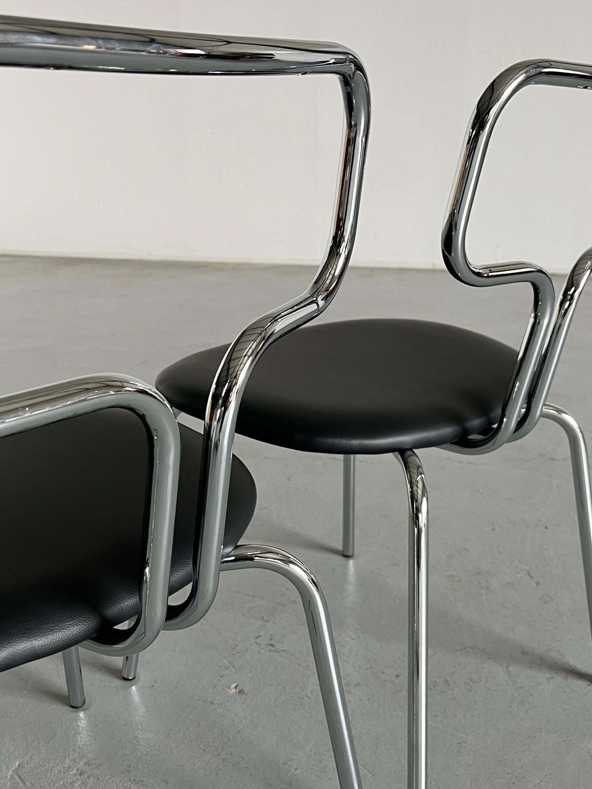 Furniture Bauhaus Design Curved Chrome Tubular Steel And Faux Leather Dining Chairs photo