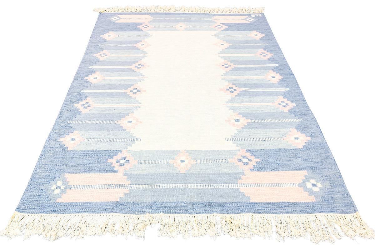 Scandinavian Rug Rollakan Soft Muted Color Palette photo furniture