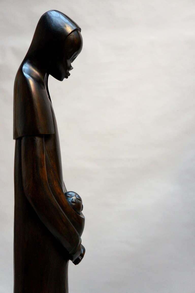 Midcentury African Hand Carved Wood Sculpture Of Maria With Child photo furniture