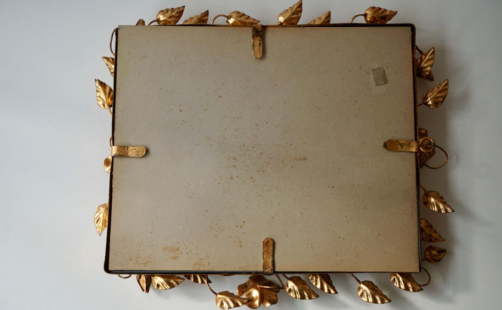 photo buy Mirror In Gilded Metal With Vine Leaves Italy, 1970s