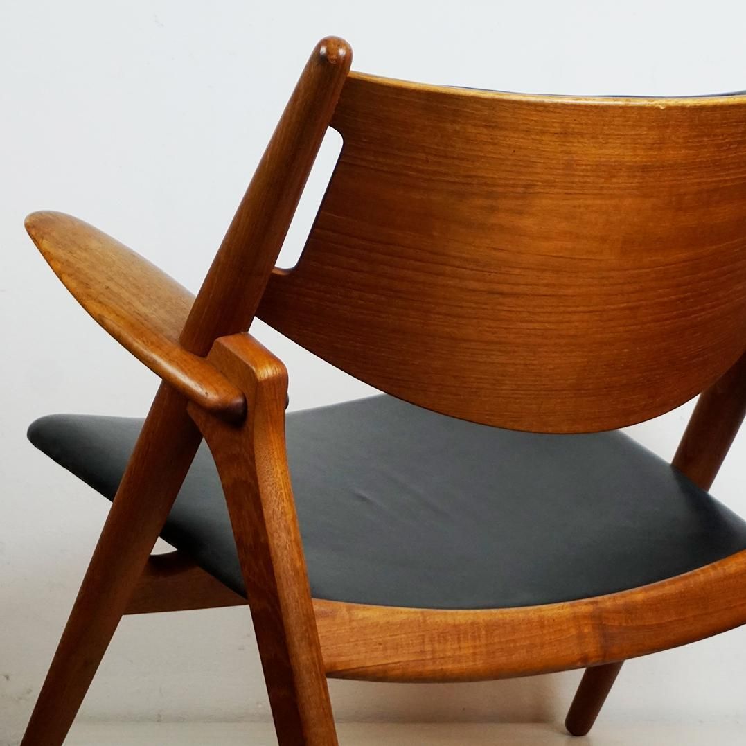 photo for sale Scandinavian Teak And Black Leather Ch28 Chair By Hans Wegner For Carl Hansen