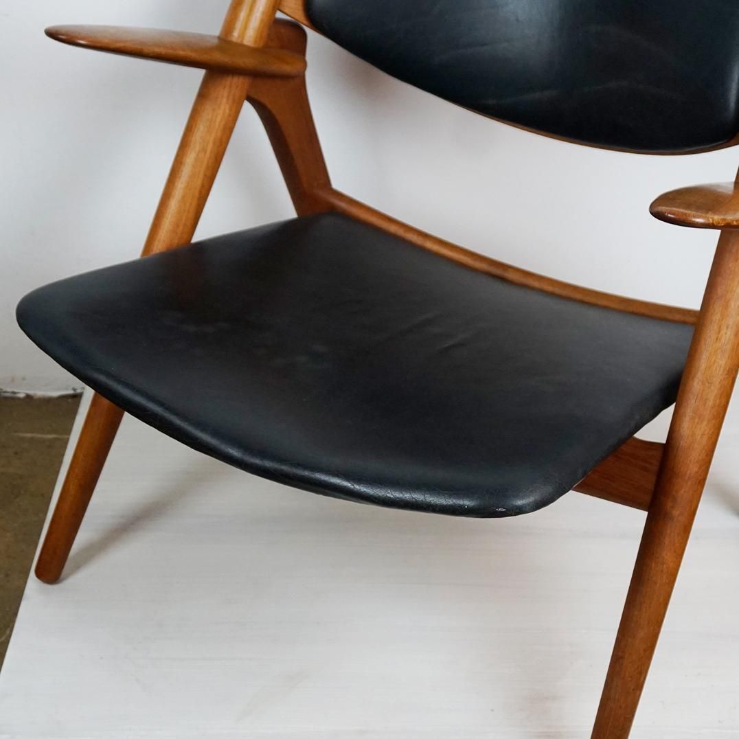 4517.0 Scandinavian Teak And Black Leather Ch28 Chair By Hans Wegner For Carl Hansen photo