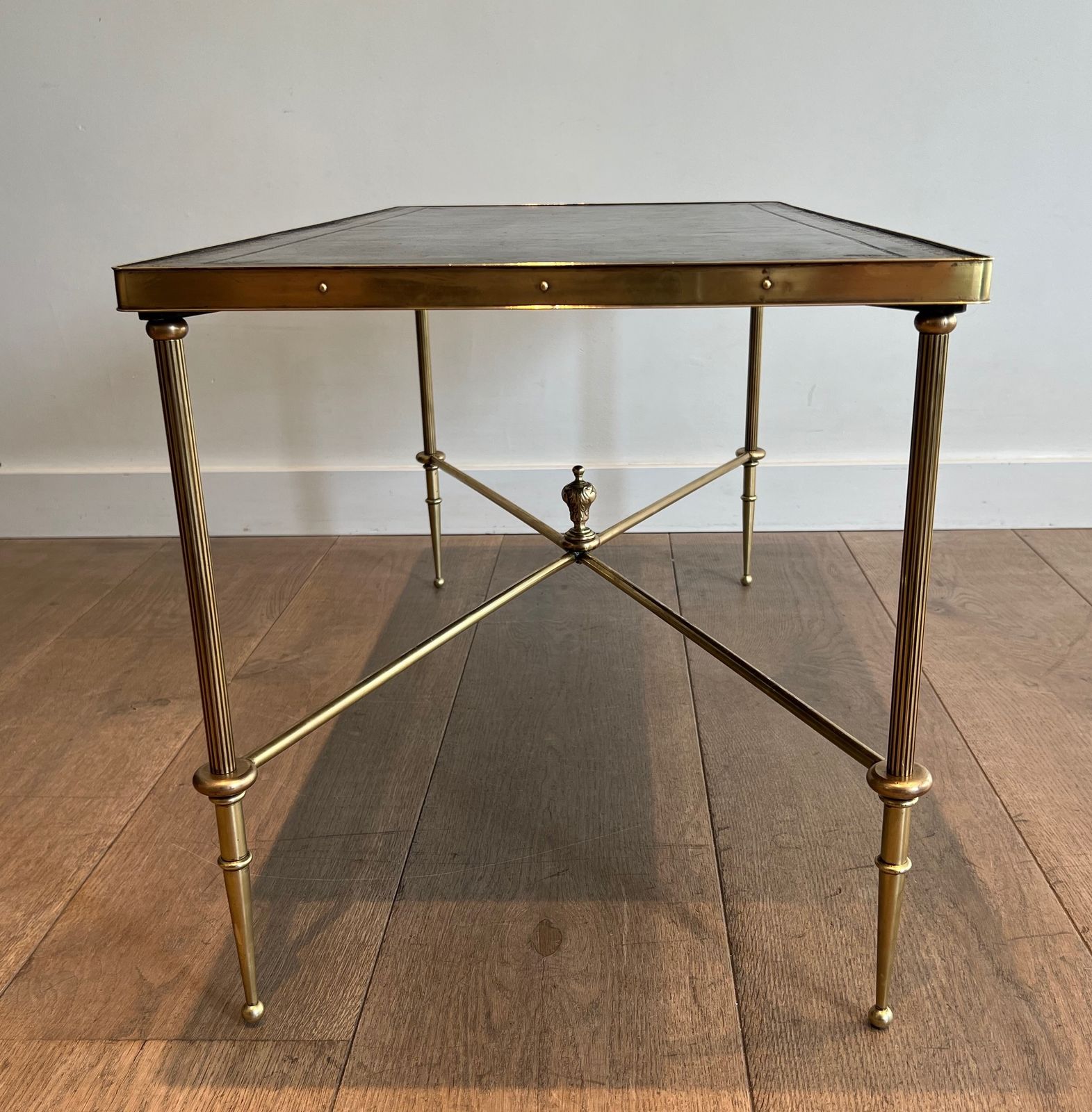 photo vinterior Neoclassical Style Brass Coffee Table With Black Leather Top And Gold Trim From Maison Jansen