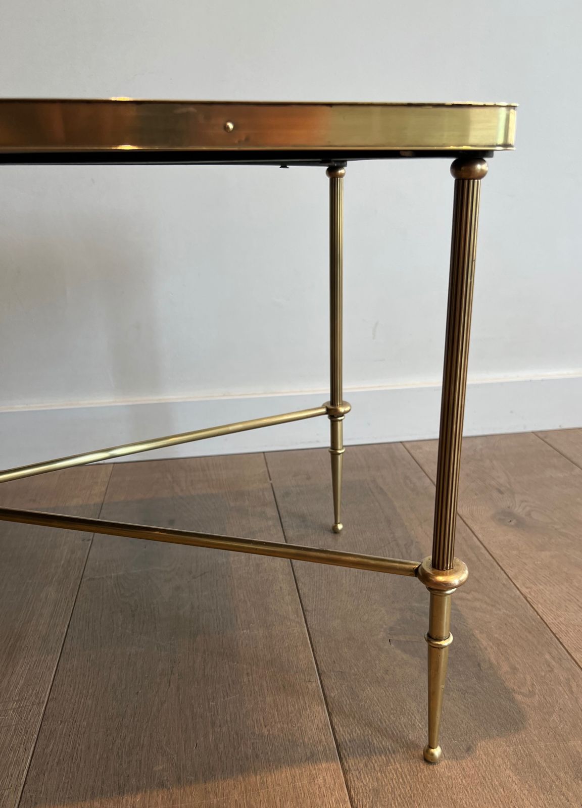 photo buy Neoclassical Style Brass Coffee Table With Black Leather Top And Gold Trim From Maison Jansen