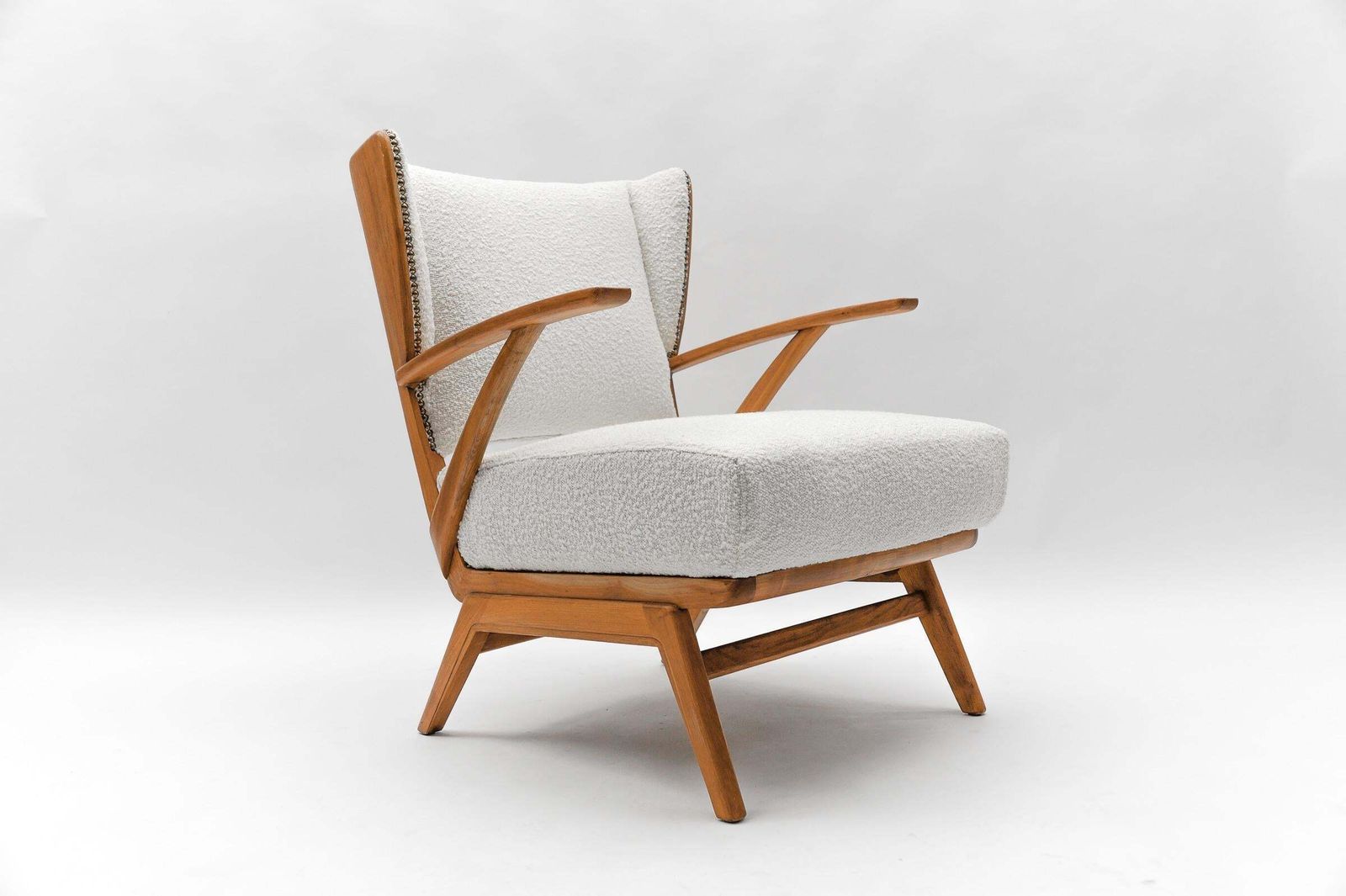 White Boucle Fabric And Wooden Wingback Armchair, Italy, 1950s photo for sale