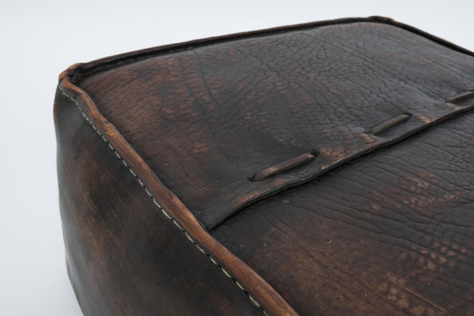 photo furniture Pair Of Mid Century Modern Handmade Neck Leather Poufs