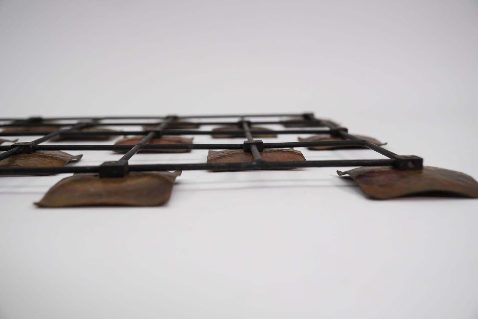 Art Hang Finished Artist Mural Made Of Copper Elements On A Metal Lattice Frame photo