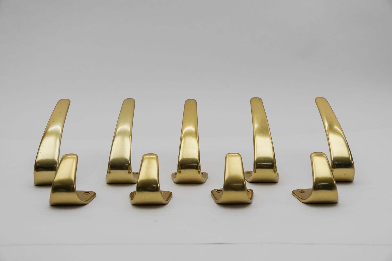 2888.0 Set Of 18 Midcentury Brass Wall Hooks, Austria, 1950s photo