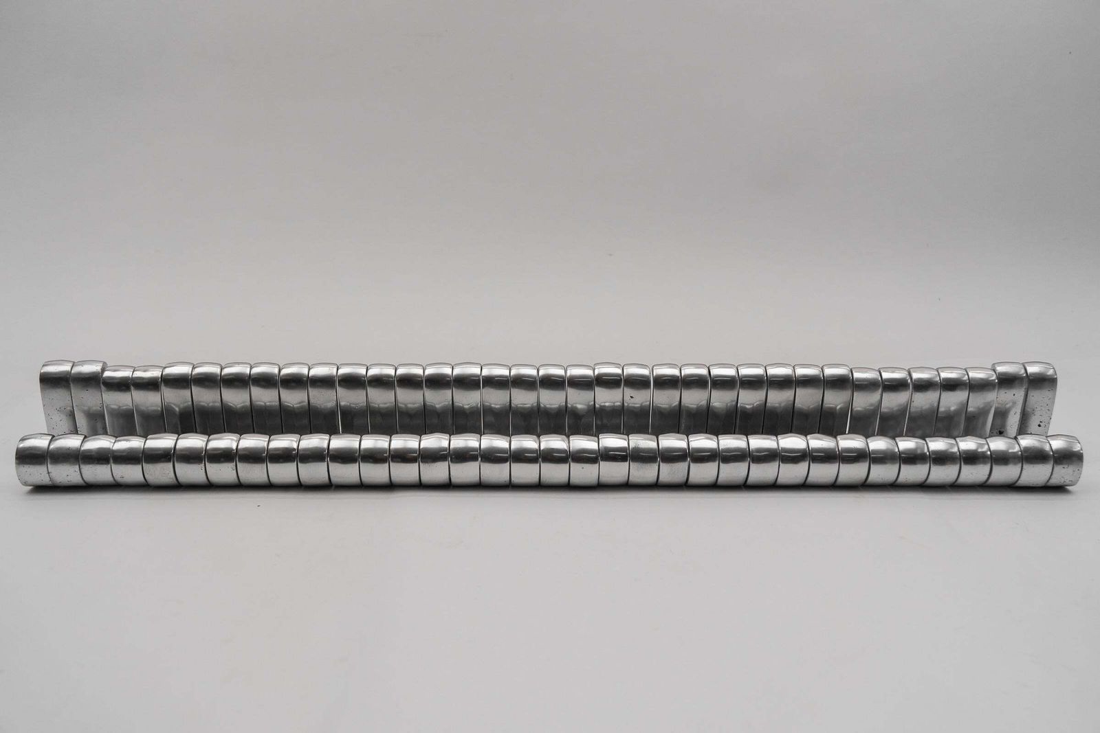 2973.0 Set Of 35 Midcentury Aluminium Wall Hooks, Austria, 1950s photo