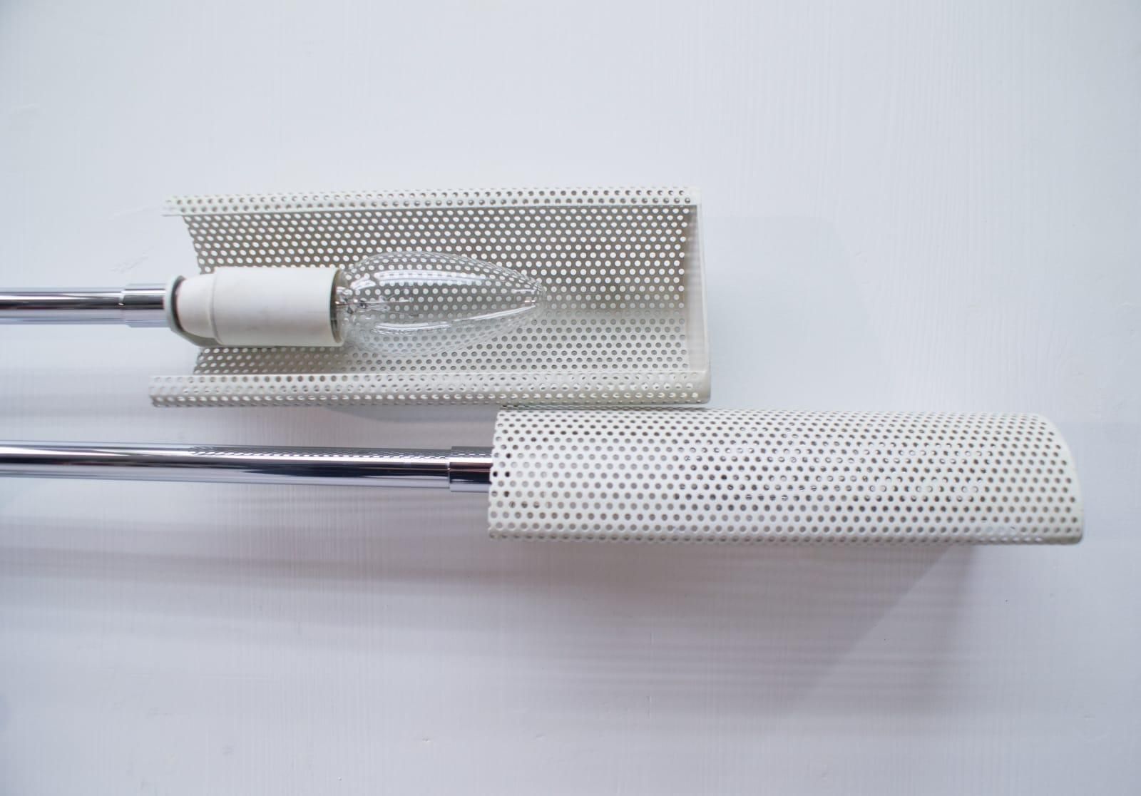 photo furniture Pair Of Swinging Wall Lamps With Perforated Plate Lampshades, 1970s