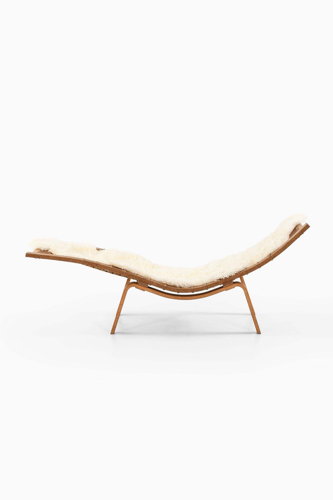 Lounge Chair In Oak And Sheepskin By Hans Wegner, Circa 1960s photo for sale