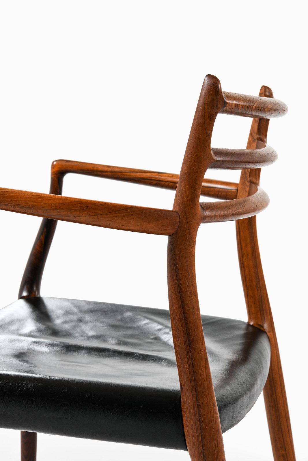 Set Of 10 Armchairs In Rosewood And Black Leather By Niels Otto Møller, 1960's photo vintage