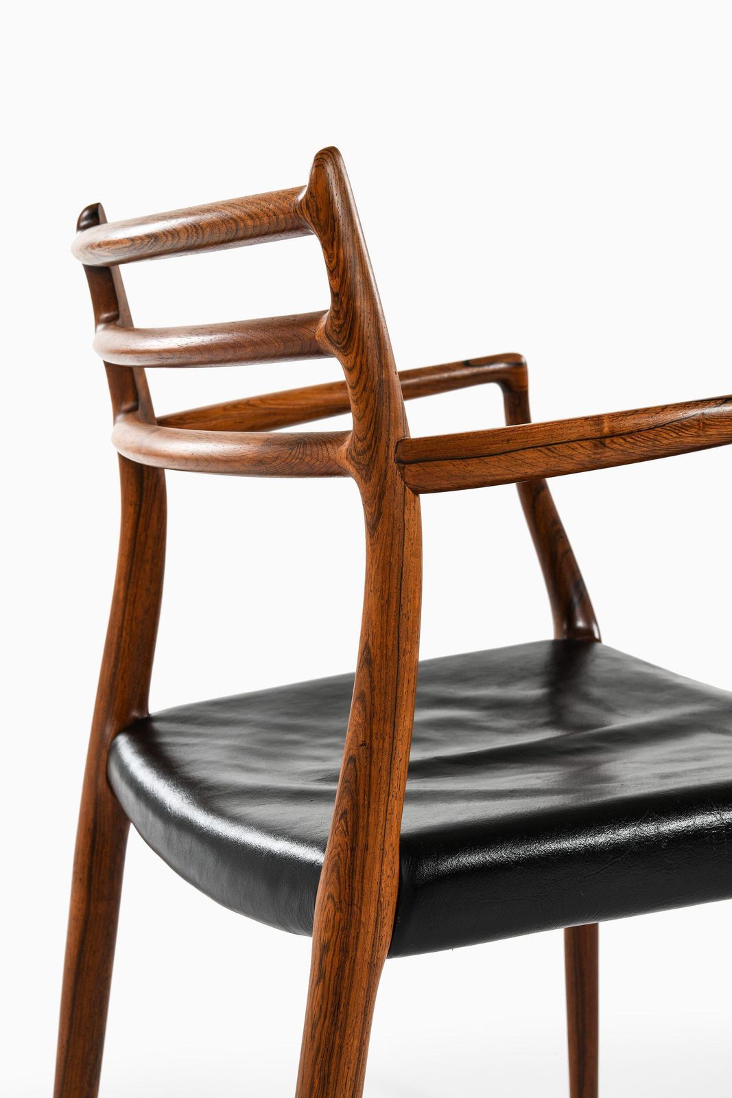 photo furniture Set Of 10 Armchairs In Rosewood And Black Leather By Niels Otto Møller, 1960's