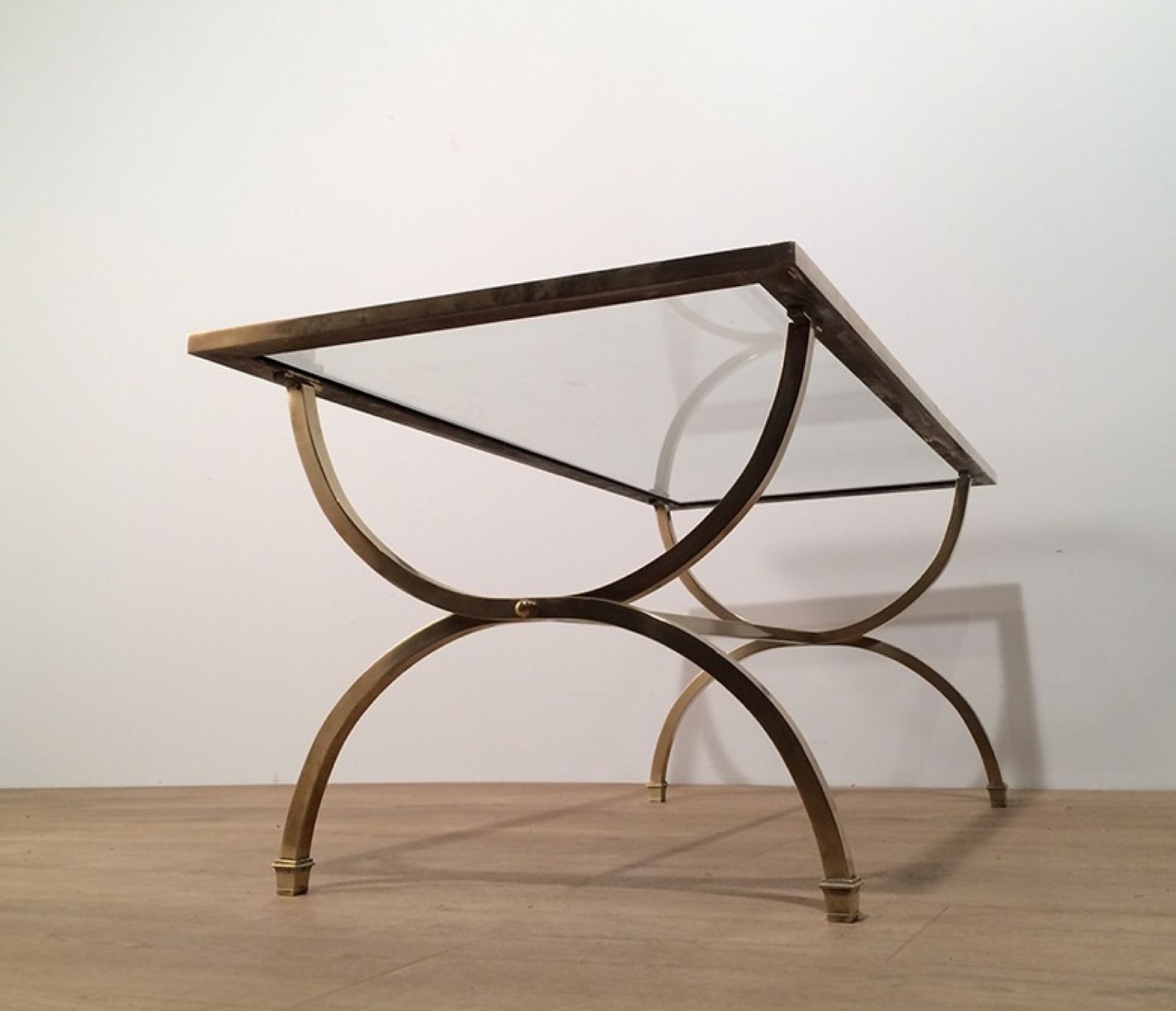Furniture Brass Coffee Table With Clear Glass Top And Black Lacquered Rim From Maison Jansen photo