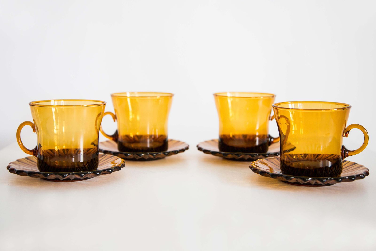 Set Of Four Mid Century Tea Glasses And Plates, Europe, 1960s photo for sale