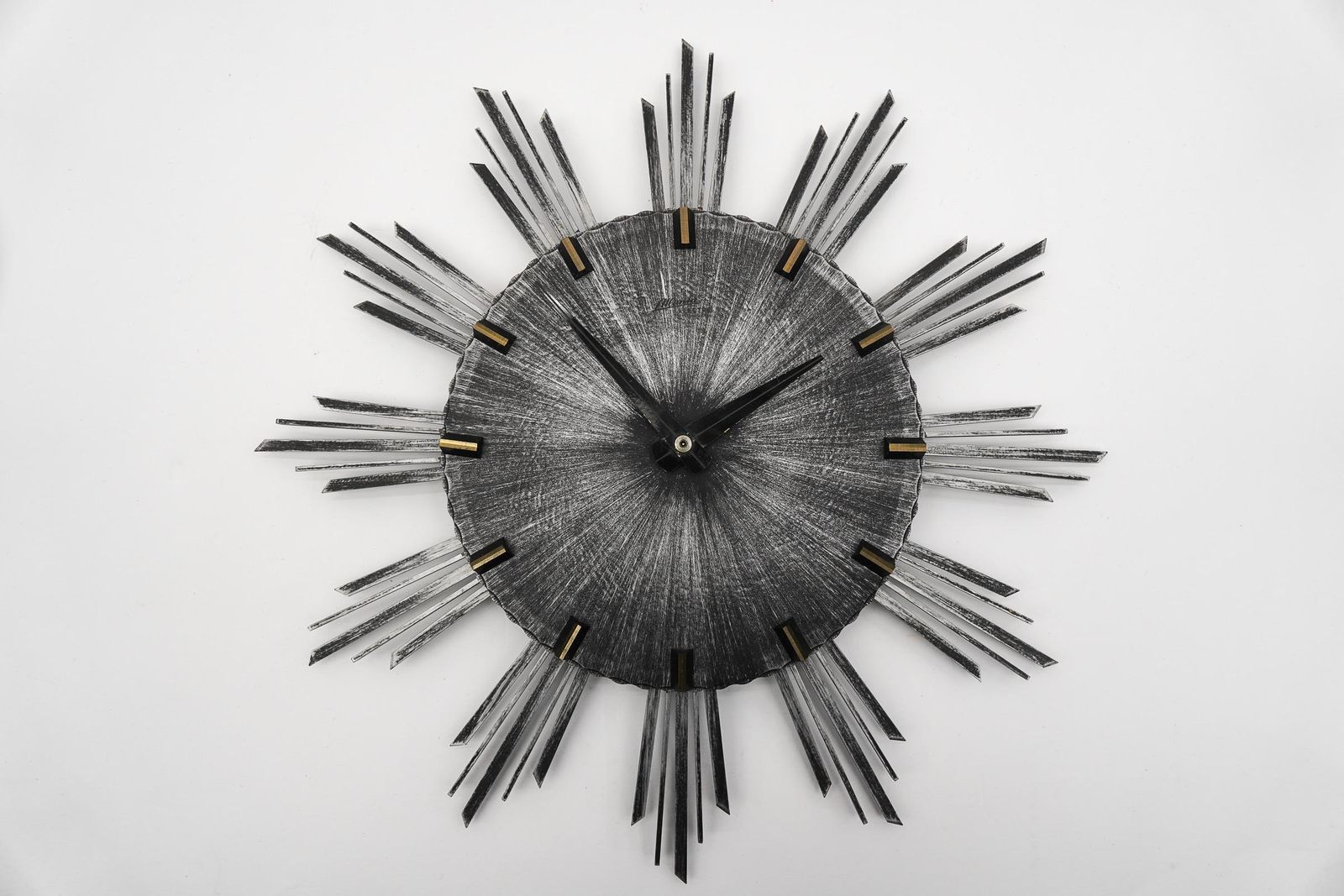 Mid Century Modern Iron And Brass Sunburst Wall Clock By Atlanta Electric photo furniture