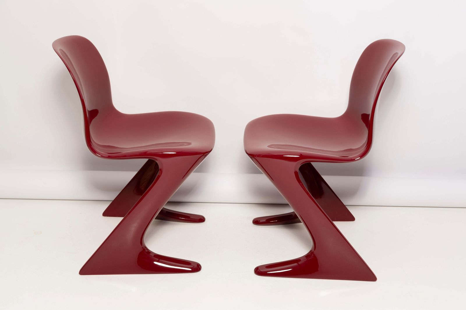 Pair Of Dark Red Wine Kangaroo Chairs Designed By Ernst Moeckl, Germany, 1968 photo for sale
