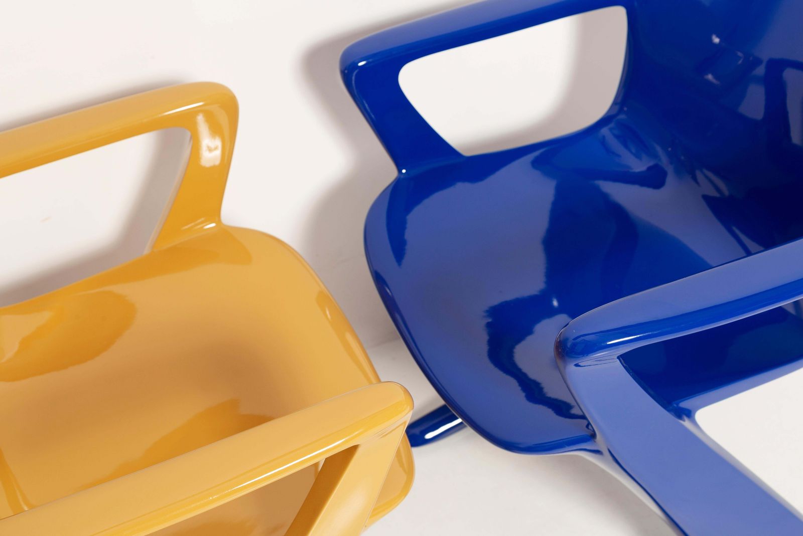 photo furniture Two Mid Century Mustard And Blue Kangaroo Chairs Ernst Moeckl, Germany, 1968