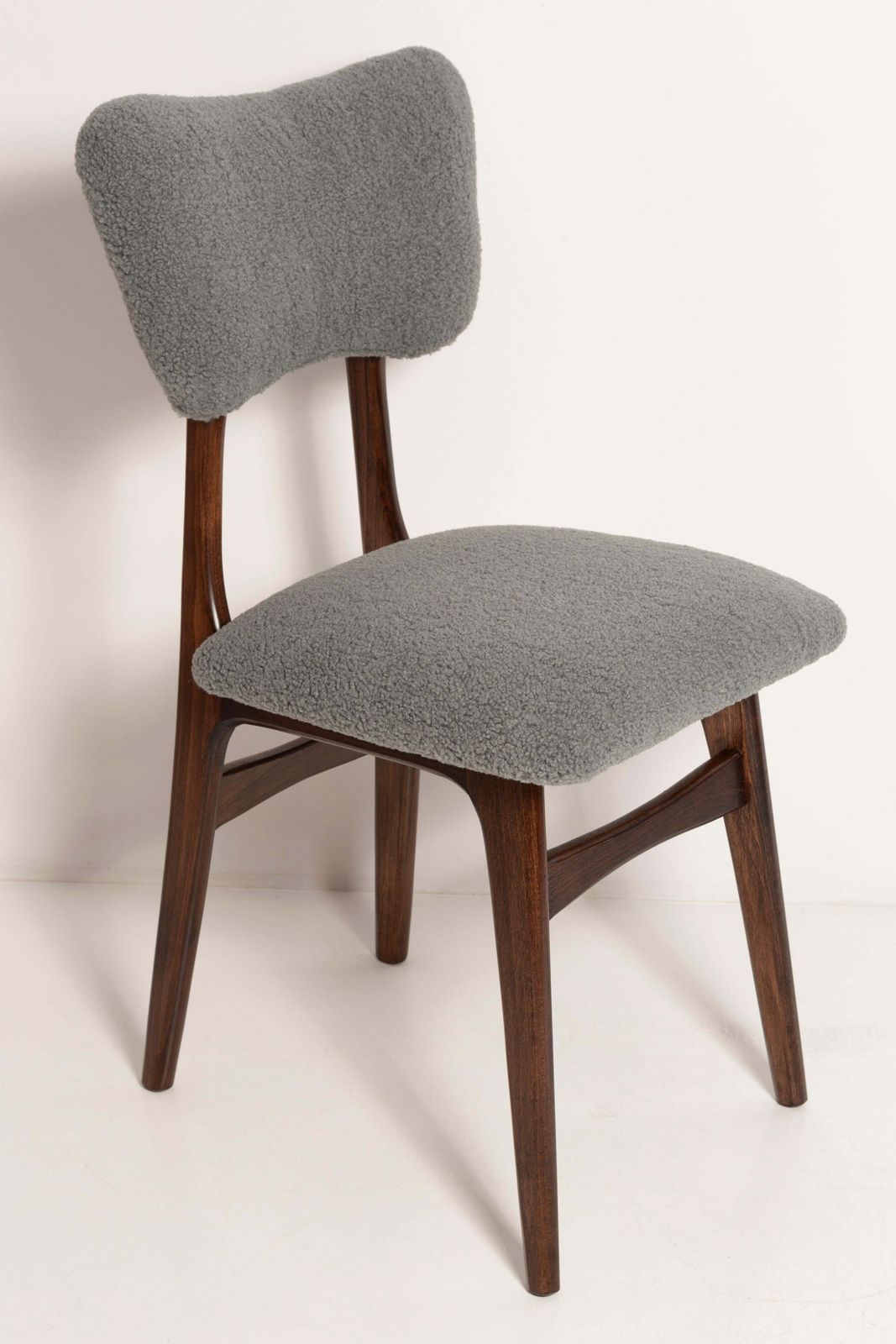 photo furniture Set Of Eight Mid Century Butterfly Dining Chairs, Gray Boucle, Europe, 1960s
