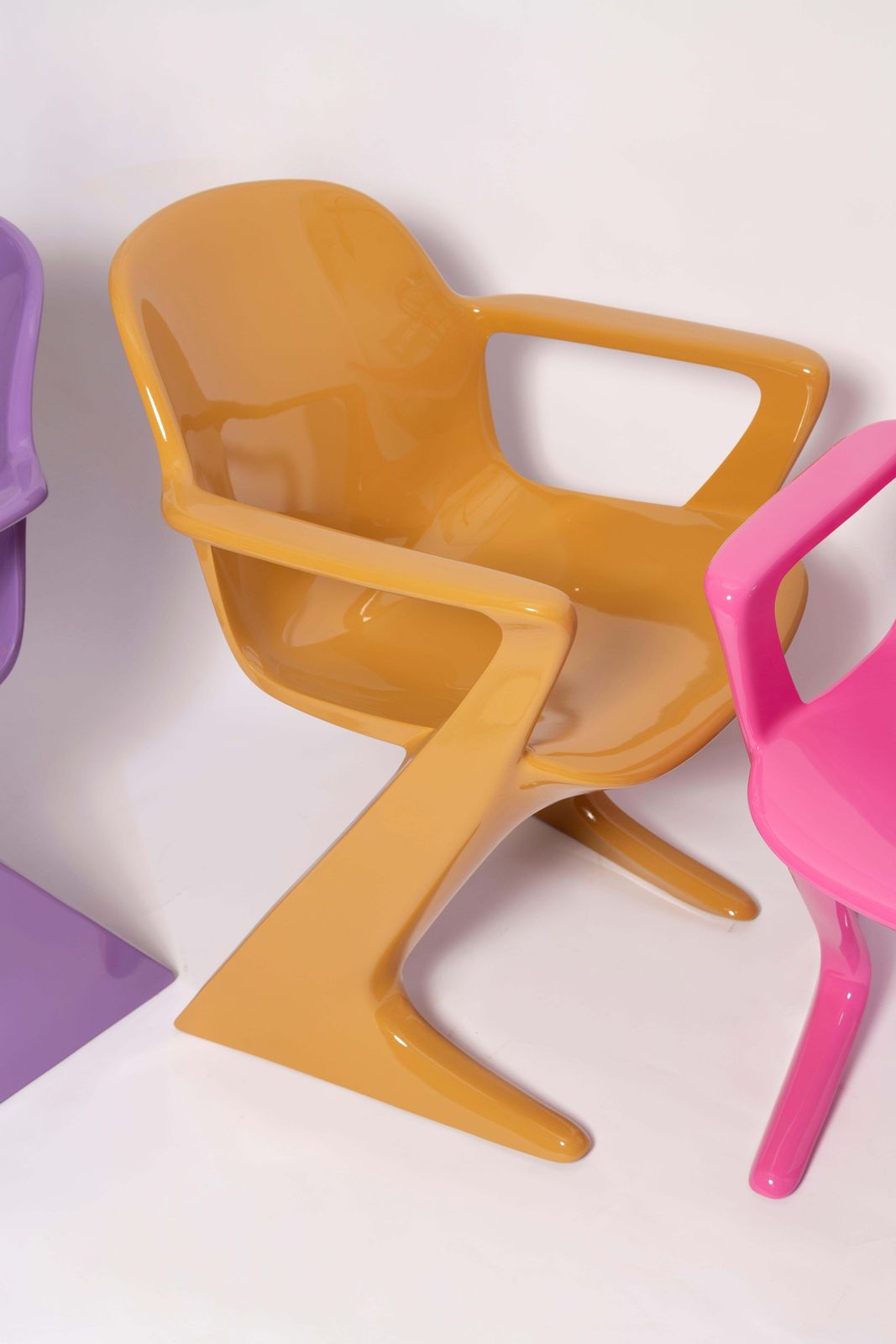 photo furniture Set Of Four Sand Pink Purple And Red Kangaroo Chairs, Ernst Moeckl, Germany 1960